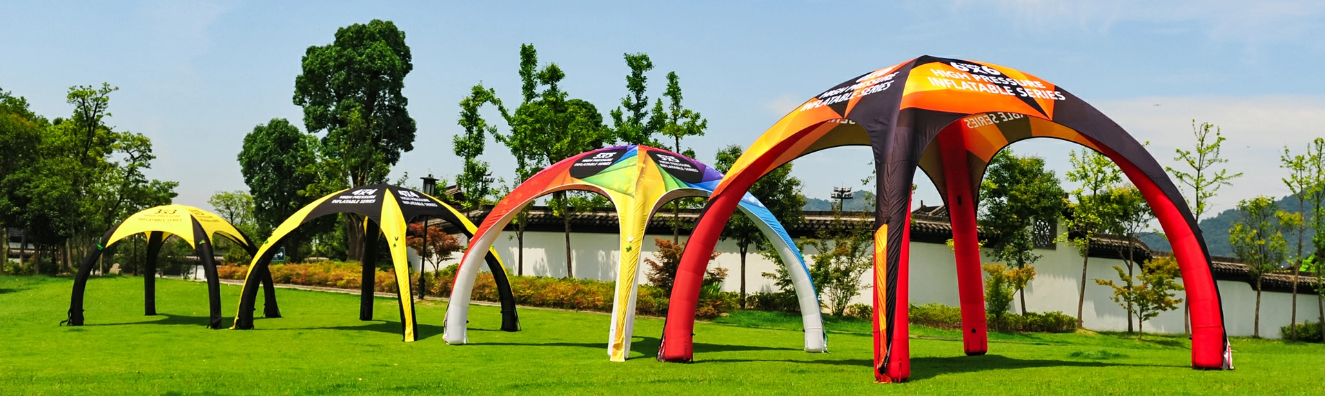 Inflatable tent for exhibition on the grass